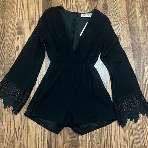 Women’s Reverse jumpsuit romper black deep v neck with lace